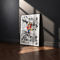 Monkey D. Luffy manga poster inspired by One Piece in a black frame against a charcoal gray wall