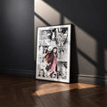 Nezuko Kamado manga poster inspired by Demon Slayer in a black frame against a charcoal gray wall