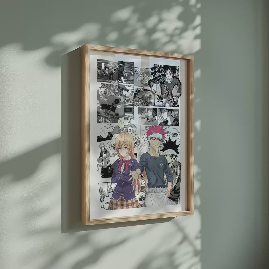 Video of the Soma Yukihira and Erina Nakiri manga poster inspired by Food Wars!: Shokugeki no Soma in a light wood frame on a sage green wall