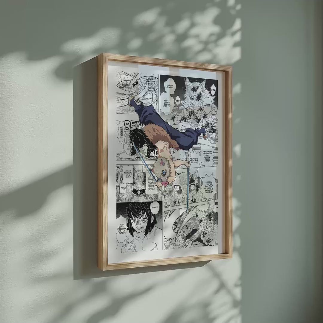 Video of the Inosuke Hashibira manga poster inspired by Demon Slayer in a light wood frame on a sage green wall