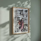Video of the Nezuko Kamado manga poster inspired by Demon Slayer in a light wood frame on a sage green wall