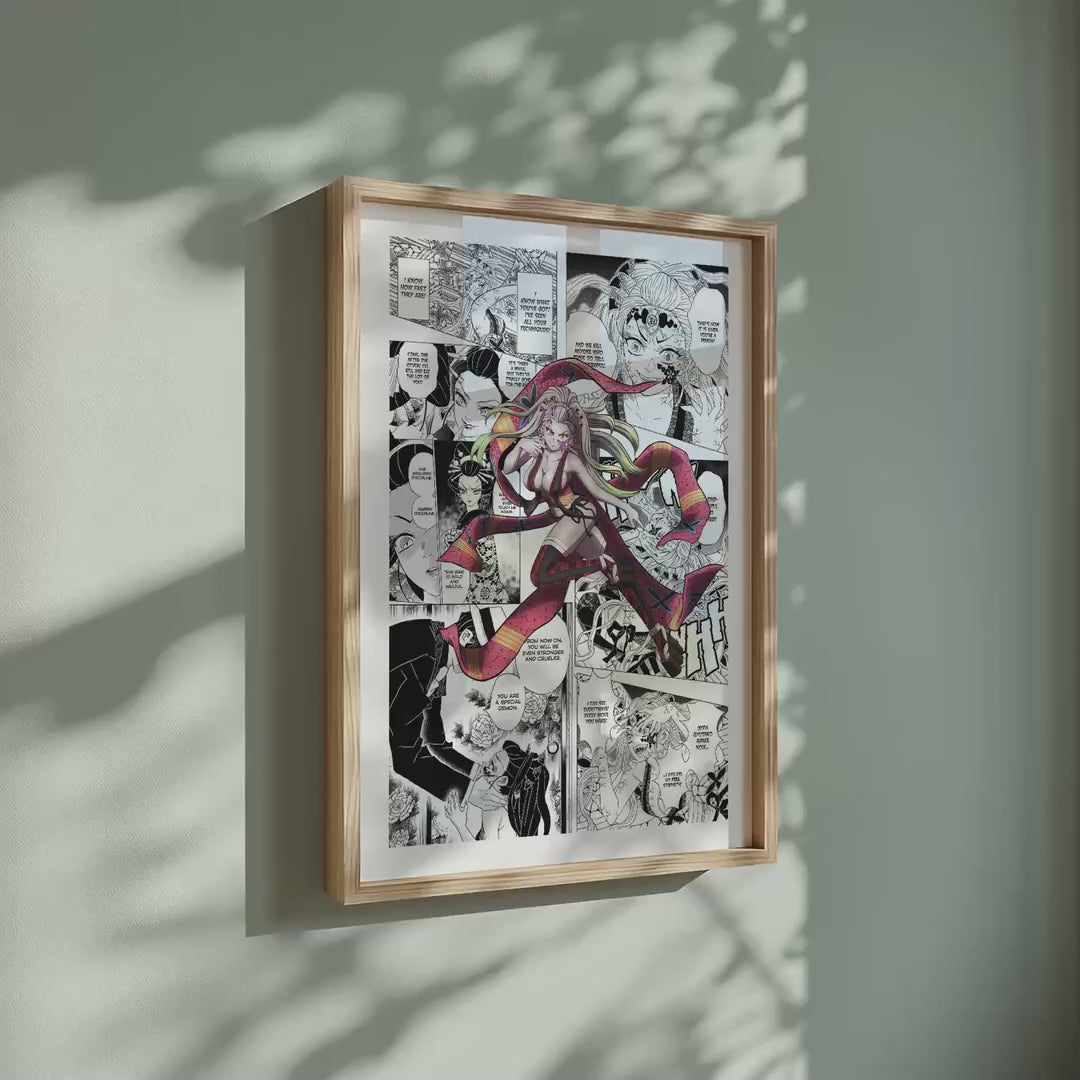 Video of the Daki manga poster inspired by Demon Slayer in a light wood frame on a sage green wall