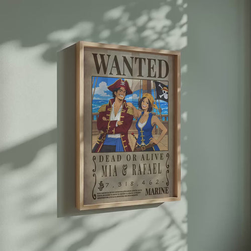 Video of the custom One Piece Wanted poster for Mia and Rafael in a light wood frame on a sage green wall