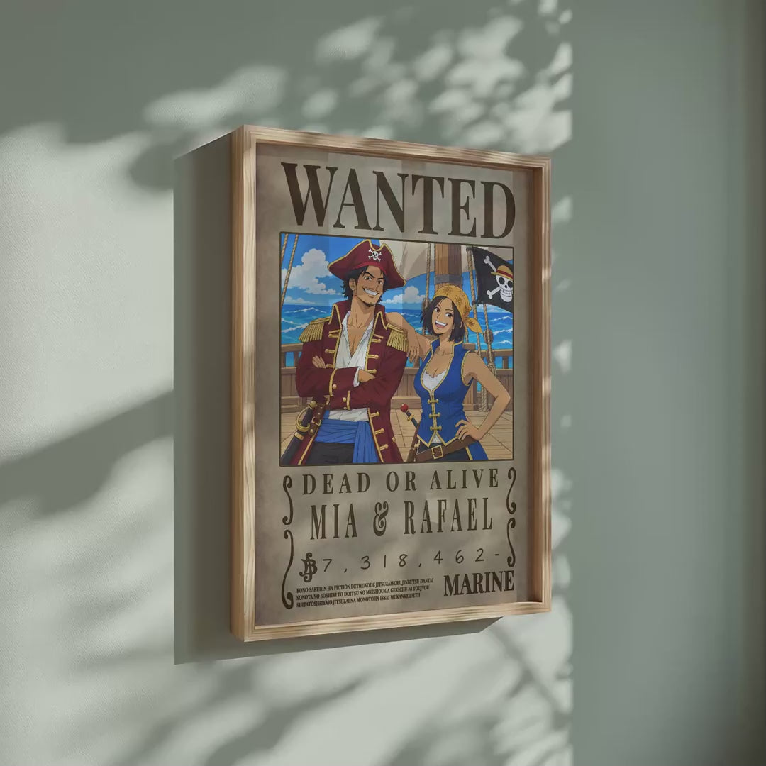 Video of the custom One Piece Wanted poster for Mia and Rafael in a light wood frame on a sage green wall