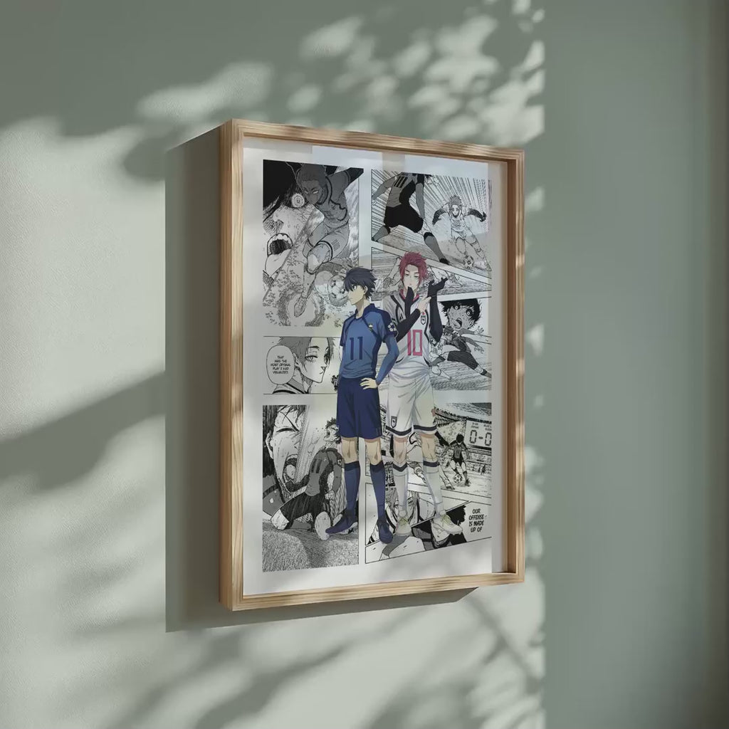 Video of the Yoichi Isagi and Sae Itoshi manga poster inspired by Blue Lock in a light wood frame on a sage green wall