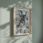 Video of the Eren Yeager manga poster inspired by Attack on Titan in a light wood frame on a sage green wall