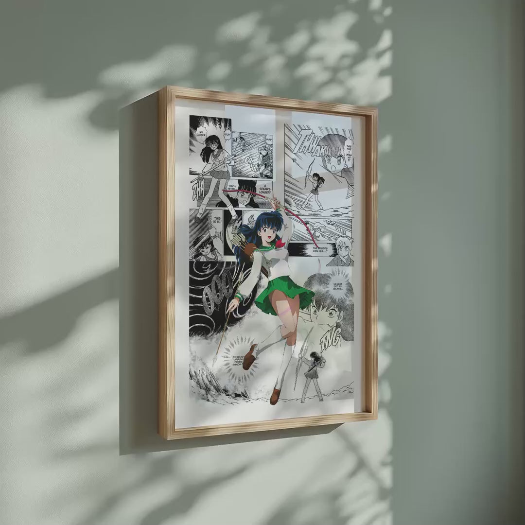 Video of the Kagome Higurashi manga poster inspired by Inuyasha in a light wood frame on a sage green wall