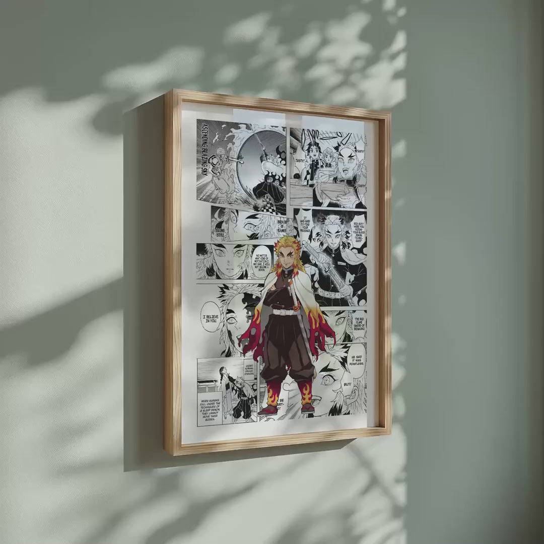Video of the Kyojuro Rengoku manga poster inspired by Demon Slayer in a light wood frame on a sage green wall