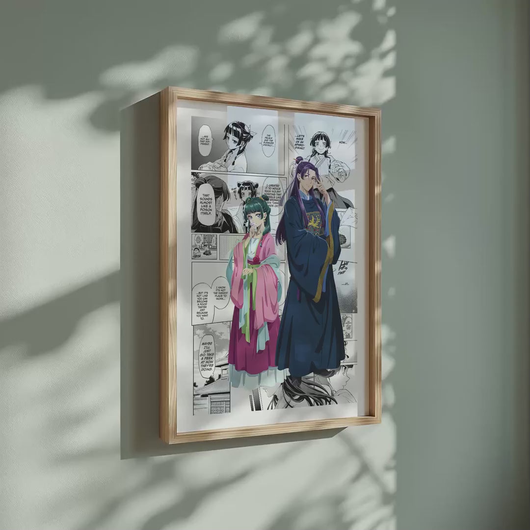Video of the Maomao and Jinshi manga poster inspired by The Apothecary Diaries in a light wood frame on a sage green wall