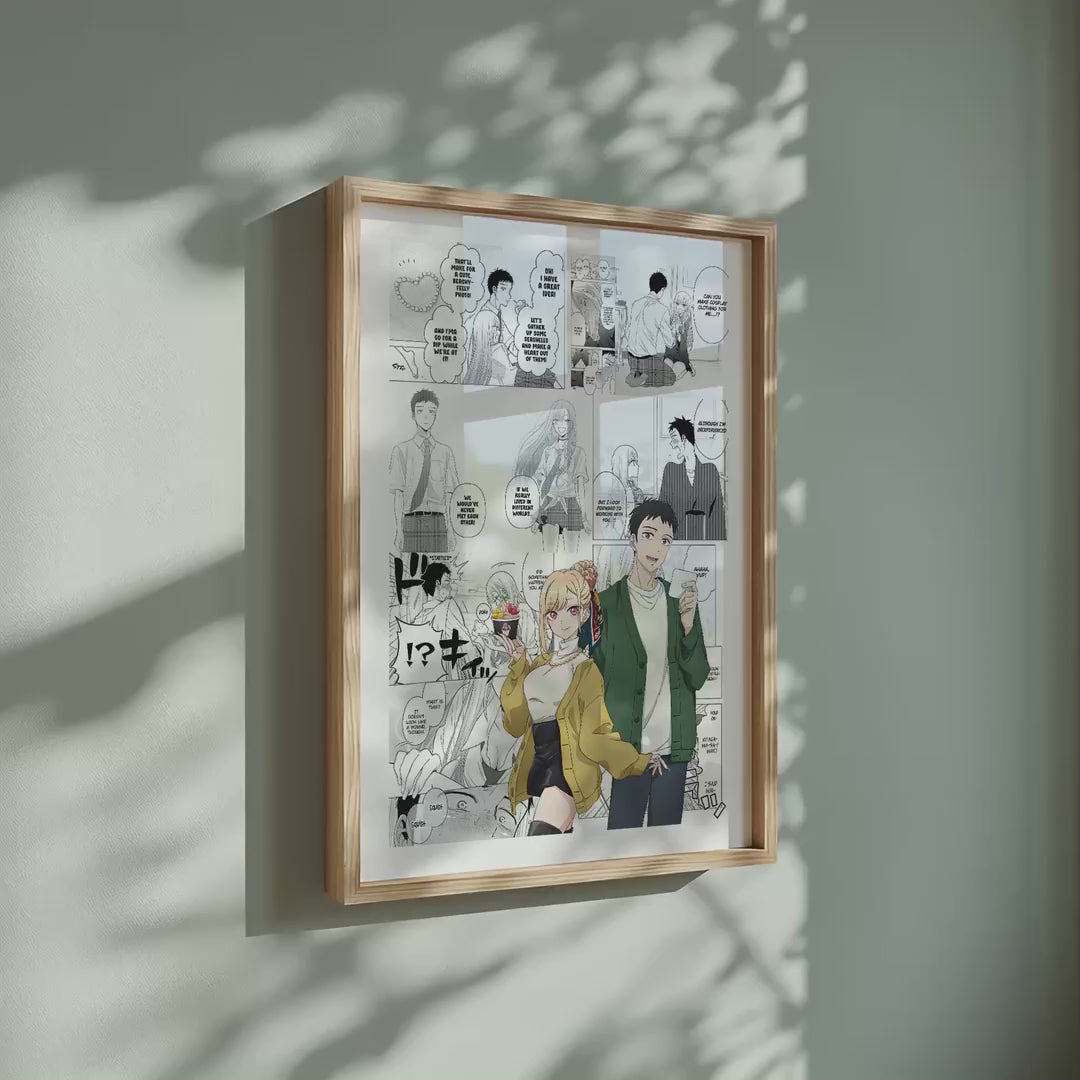 Video of the Marin Kitagawa and Wakana Gojo manga poster inspired by My Dress-Up Darling in a light wood frame on a sage green wall