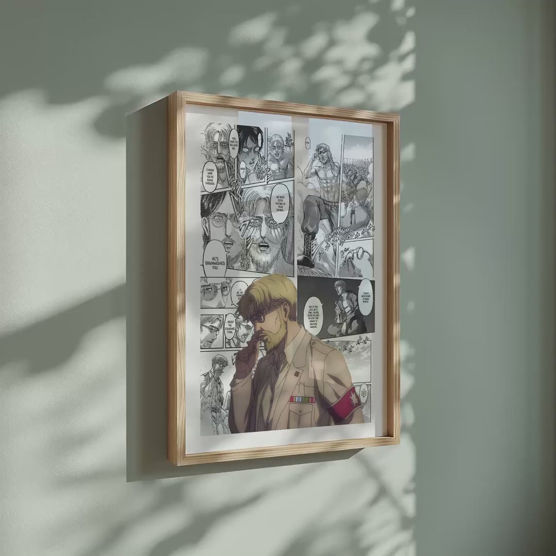 Video of the Zeke Yeager manga poster inspired by Attack on Titan in a light wood frame on a sage green wall