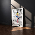 Usagi Tsukino Sailor Moon manga poster inspired by Sailor Moon in a black frame against a charcoal gray wall