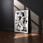 Satoru Gojo Shinjuku Showdown manga poster inspired by Jujutsu Kaisen in a black frame against a charcoal gray wall